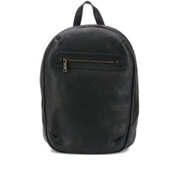 weathered leather backpack