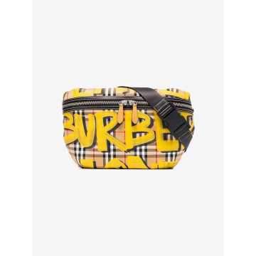 yellow, black and brown sonny graffiti belt bag