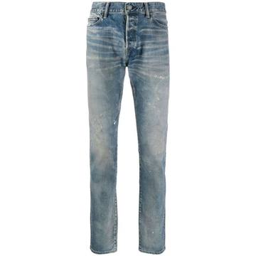 low rise distressed effect jeans