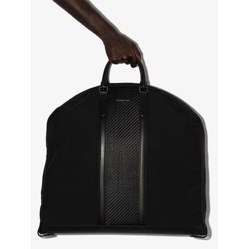 Black leather trim suit bag