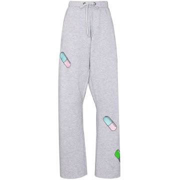 pill graphic jersey track pants