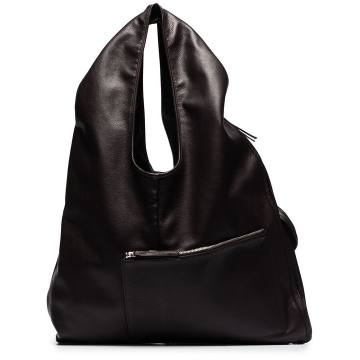 brown reporter leather shoulder bag