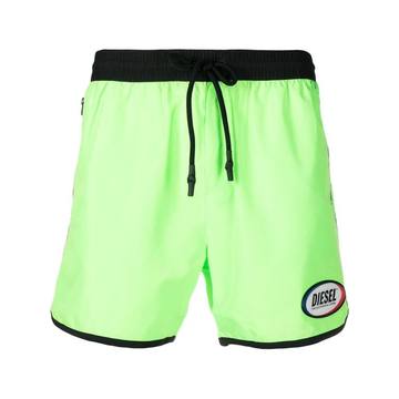 neon swimming trunks