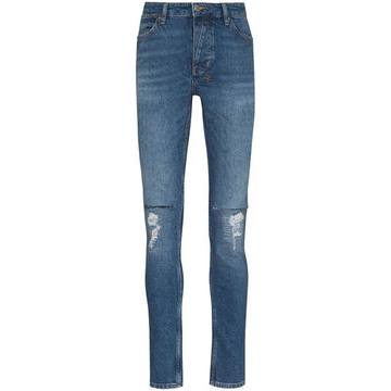 distressed-effect skinny-fit jeans