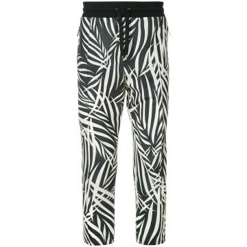 palm print tapered trousers