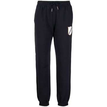 crest-patch track pants