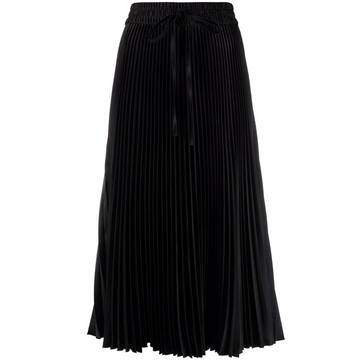 high-waisted pleated skirt