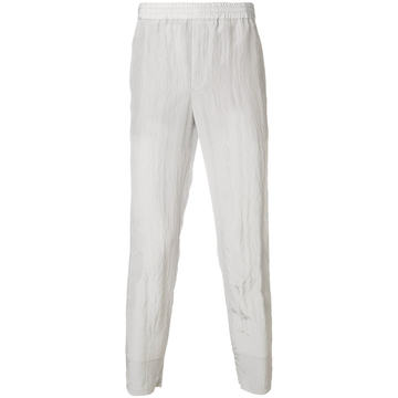 creased tapered trousers